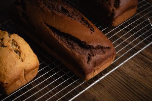 Loaves of pumpkin bread in oven