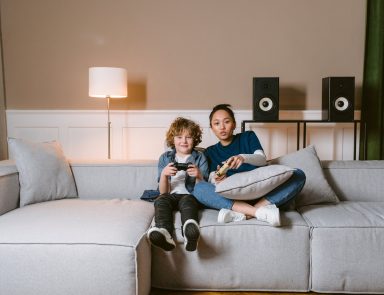 Girl and boy playing video games