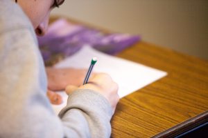 Person taking written test