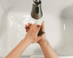 Person washing hands