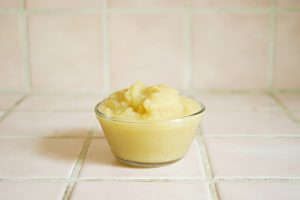 Image of apple sauce on the counter in a glass bowl