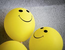 Yellow smiling balloons