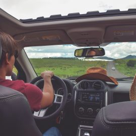 Teens driving car