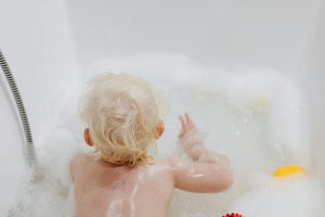 Child in bath tub
