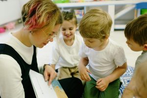 Teacher reading to children